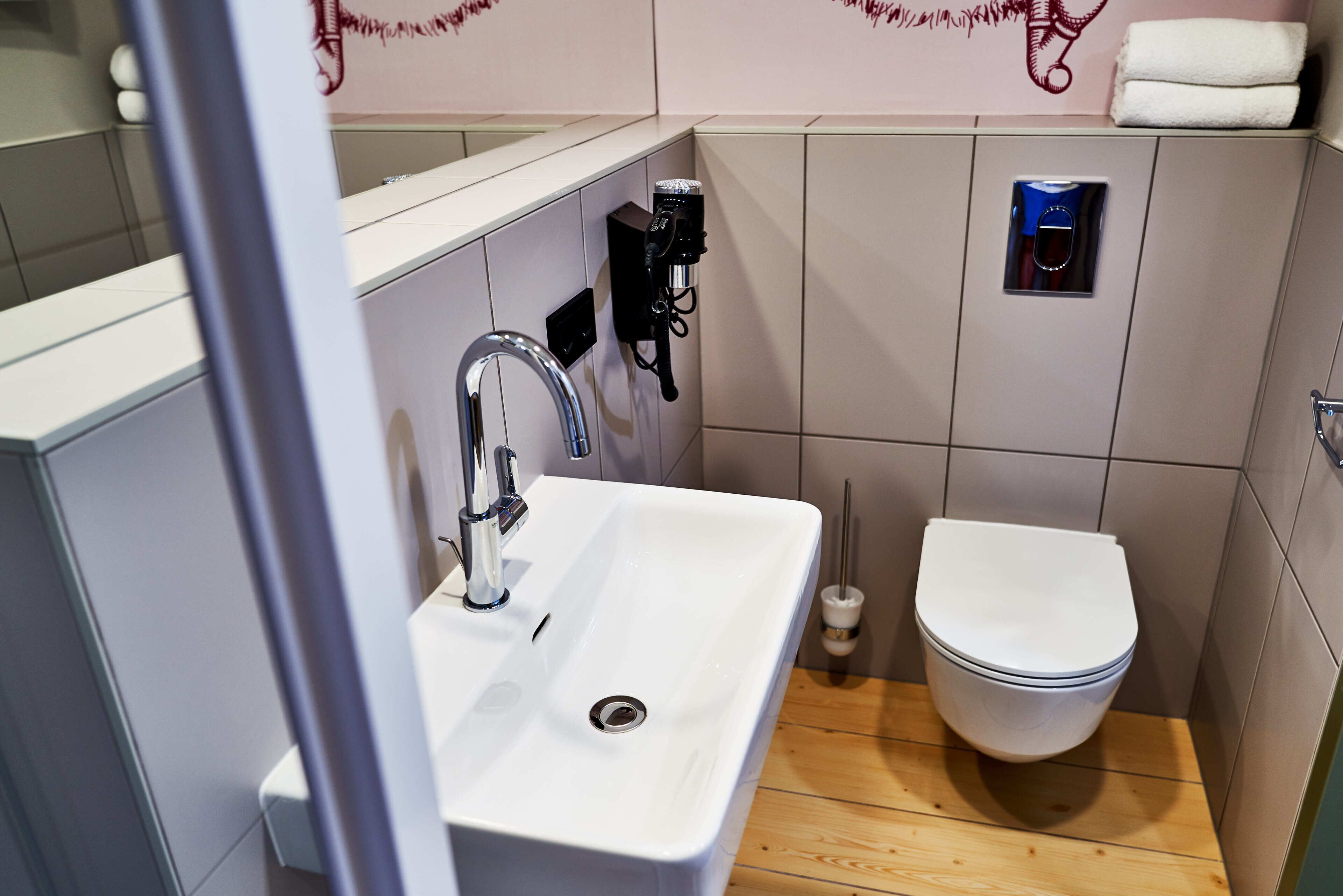 shower, rainfall showerhead, hair dryer, towels