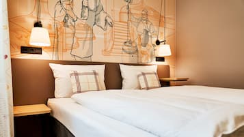 Habitación doble Confort | Espacio para trabajar con laptop, wifi gratis y ropa de cama