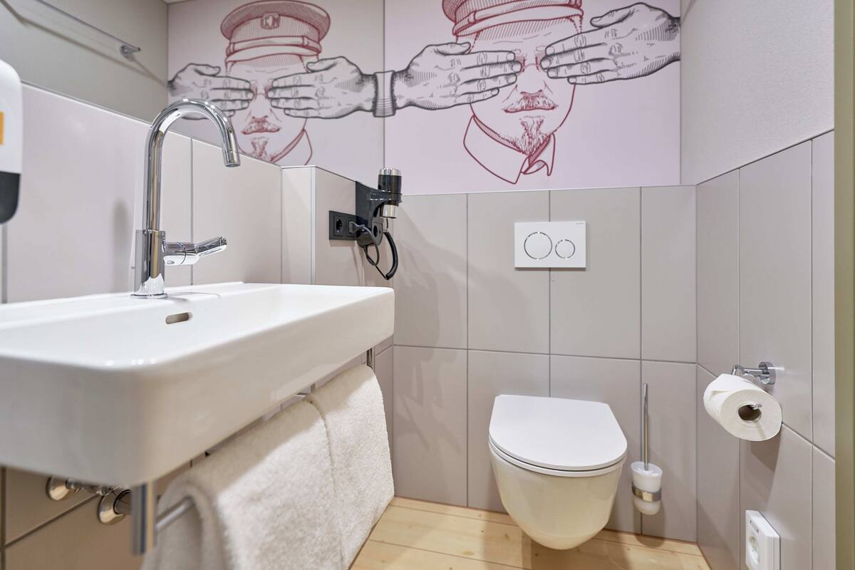 shower, rainfall showerhead, hair dryer, towels