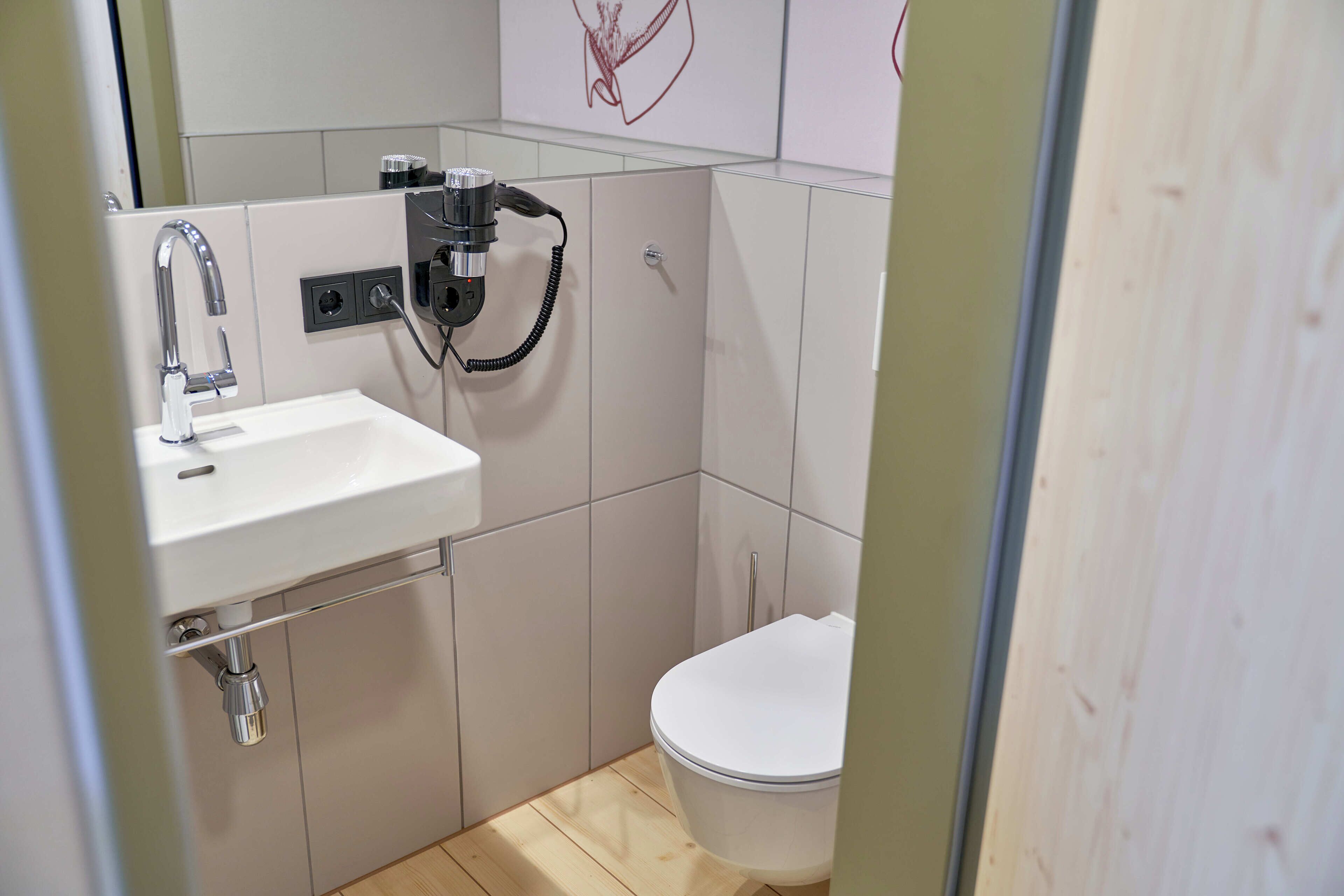 shower, rainfall showerhead, hair dryer, towels