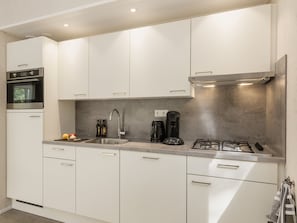 Fridge, microwave, dishwasher, coffee/tea maker
