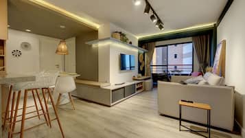 Apartamento família | Área de estar