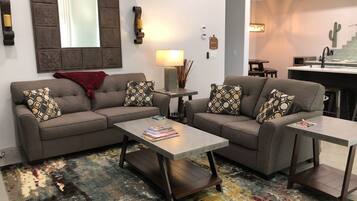 Smart TV, fireplace, books, offices