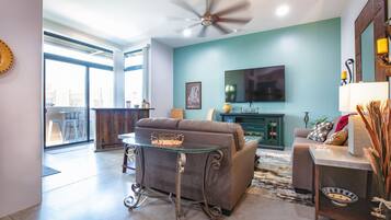 Smart TV, fireplace, books, offices