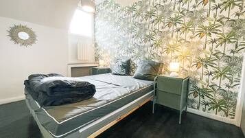 2 habitaciones y ropa de cama