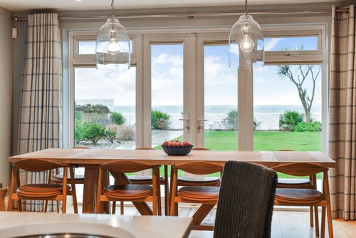 Superb beach house with beautiful garden, hot tub & direct private beach access