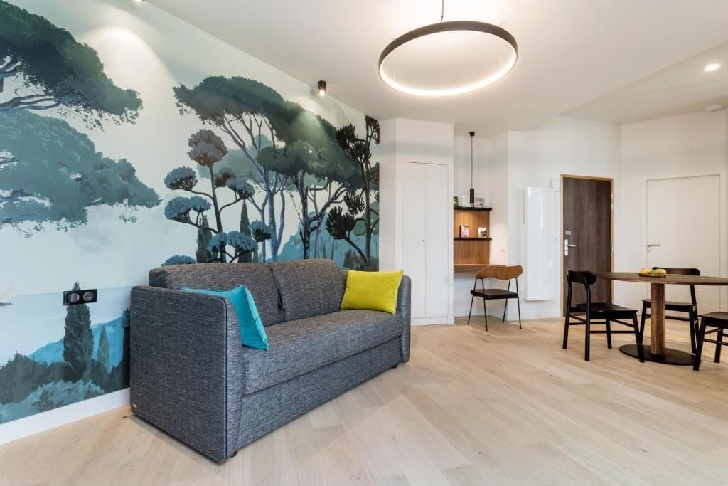 comfort apartment | living area | flat-screen tv