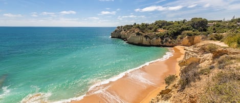 Beach nearby, sun loungers
