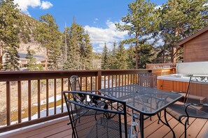 Outdoor dining - Spacious Riverfront Retreat • Private Hot Tub (Estes Park)
