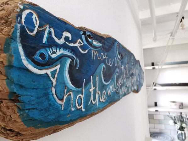 A wooden sign with the text "Once upon a time, and the waves." - Winslow Cottage, Stylish Cosy Cottage with Spectacular Sea Views (Newlyn)