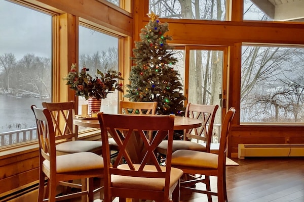 Dining room during fall/winter, overlooking lake. Song Mountain can be seen too.