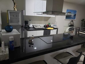 Microwave, coffee/tea maker, cookware/dishes/utensils