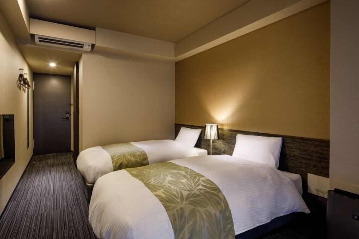 Down duvets, pillow-top beds, desk, blackout curtains