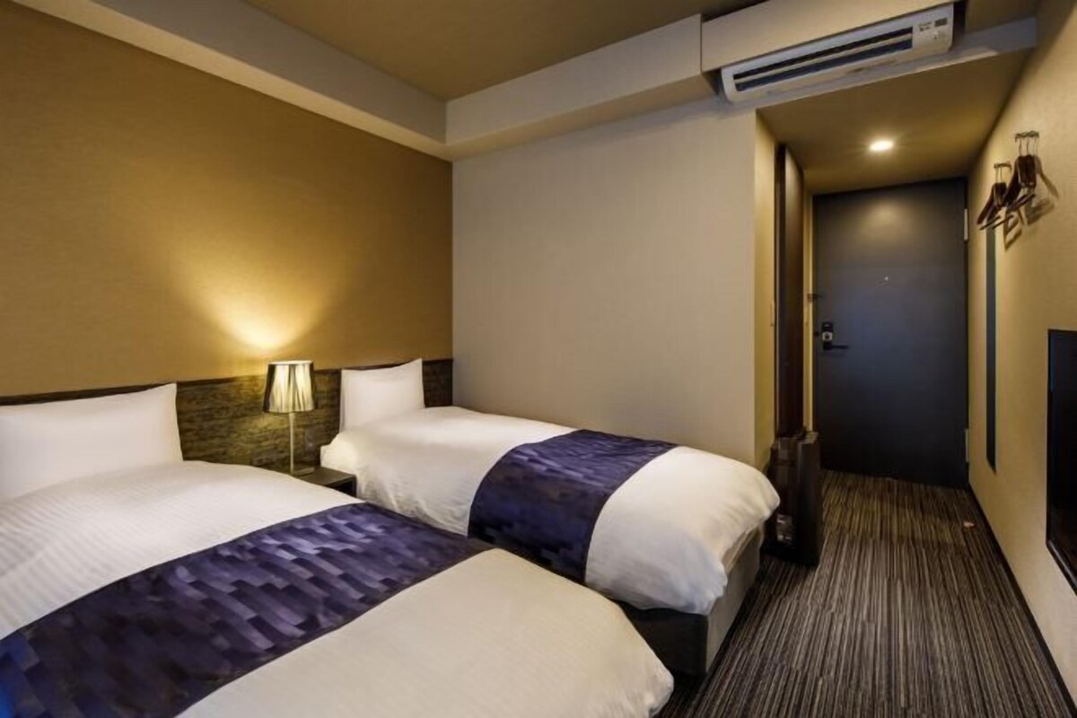 Down duvets, pillow-top beds, desk, blackout curtains