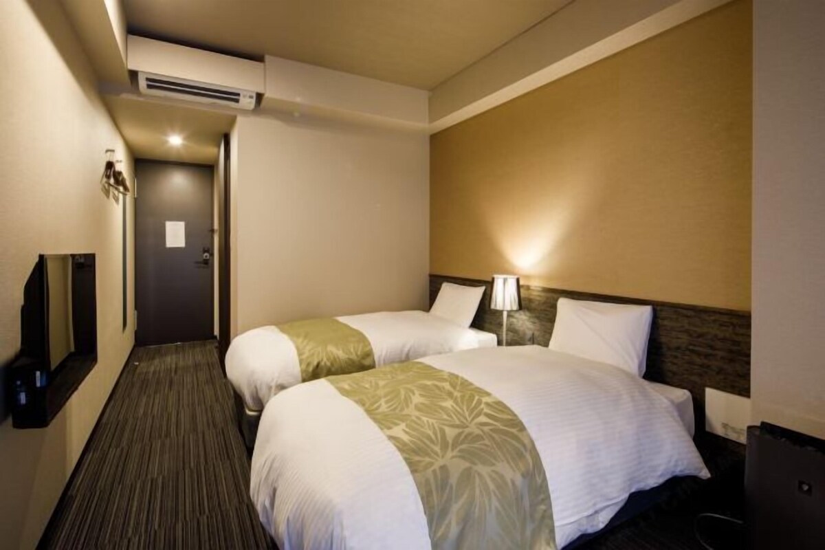 Down duvets, pillow-top beds, desk, blackout curtains