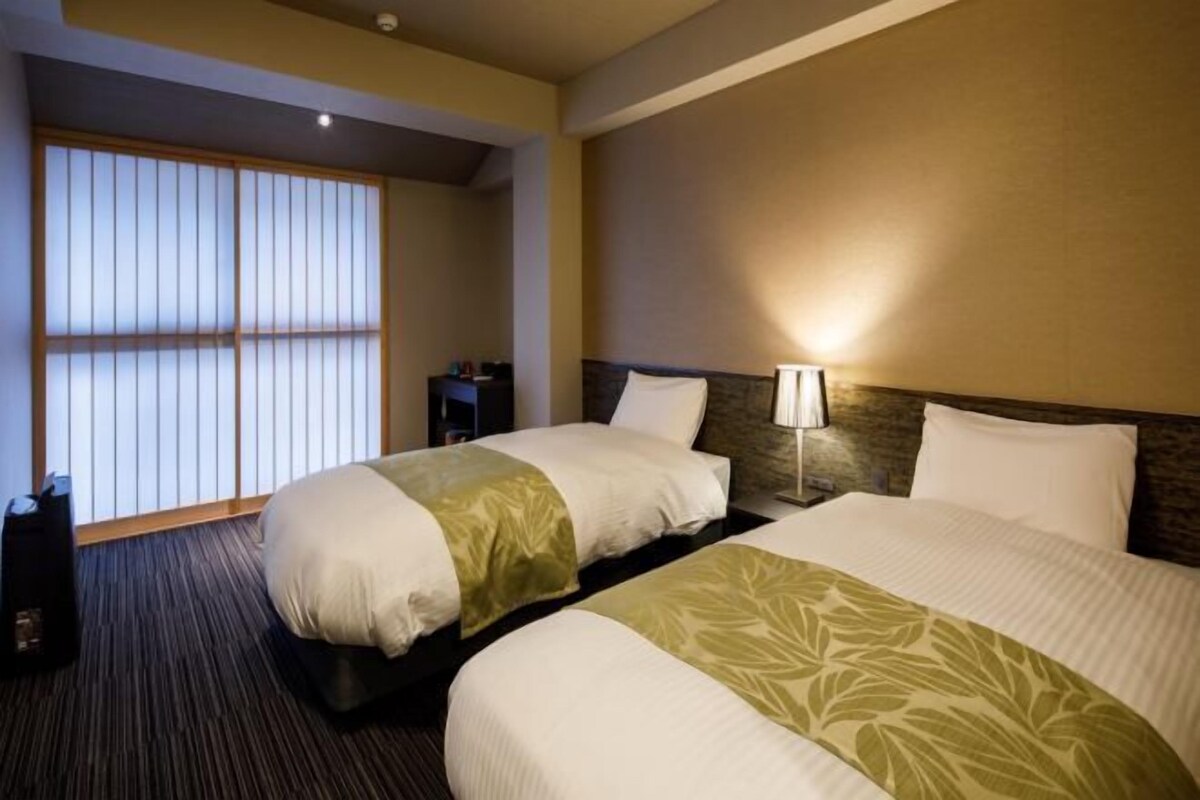 Down duvets, pillow-top beds, desk, blackout curtains