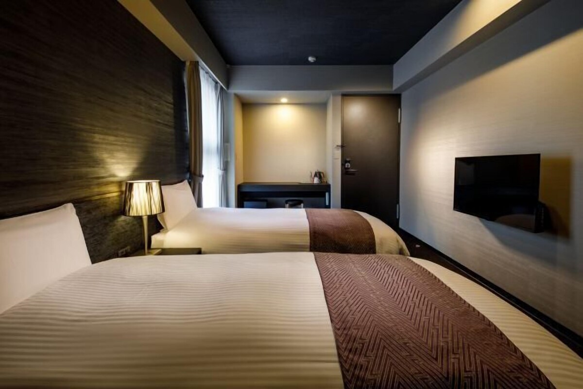 Down duvets, pillow-top beds, desk, blackout curtains