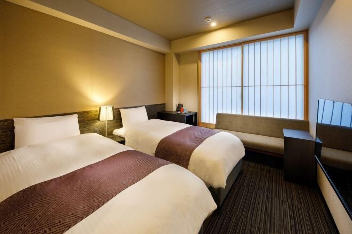 Down duvets, pillow-top beds, desk, blackout curtains