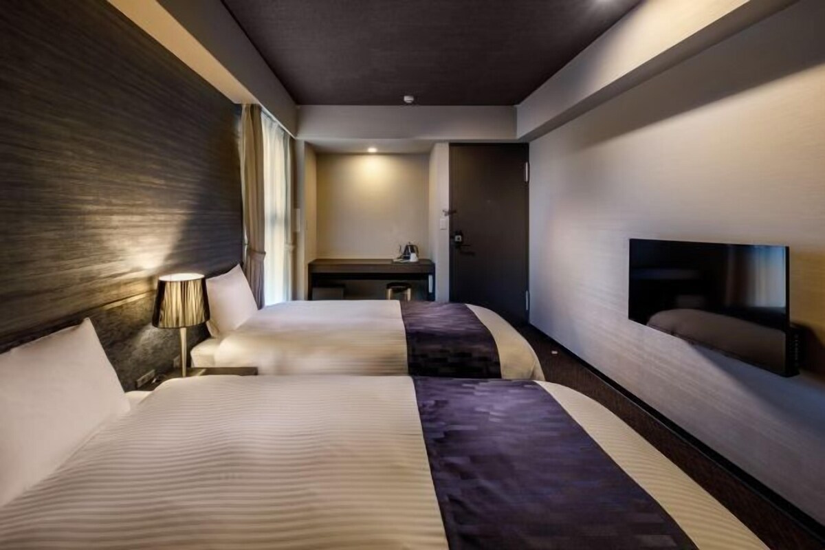 Down duvets, pillow-top beds, desk, blackout curtains