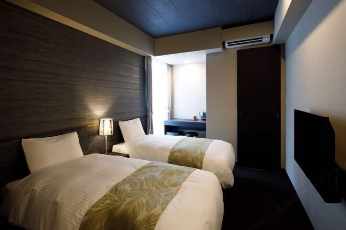Down duvets, pillow-top beds, desk, blackout curtains