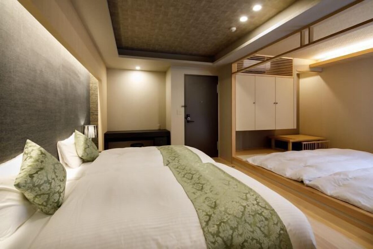 Down duvets, pillow-top beds, desk, blackout curtains