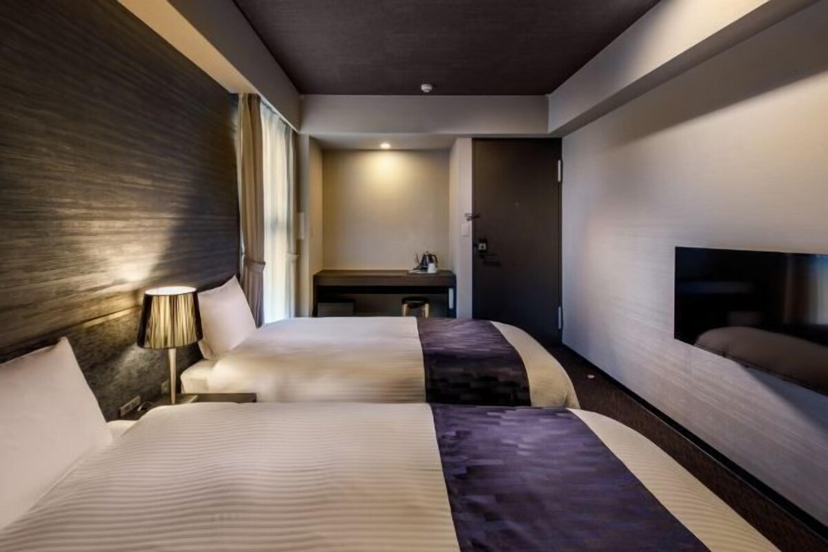 Down duvets, pillow-top beds, desk, blackout curtains
