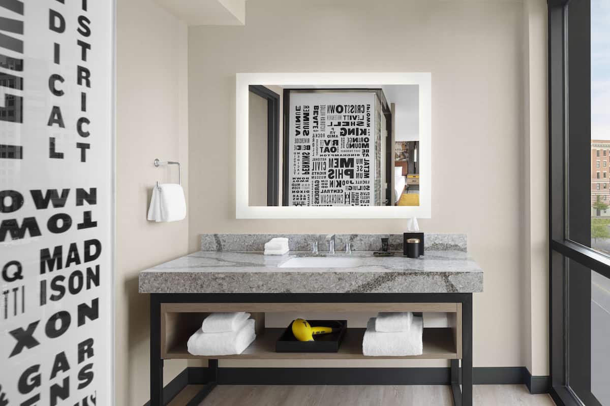 suite (beale street) | bathroom | rainfall showerhead, hair dryer, bathrobes, towels