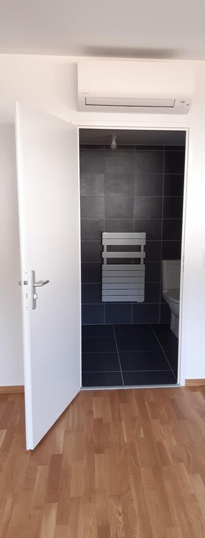 Shower, towels, soap, toilet paper