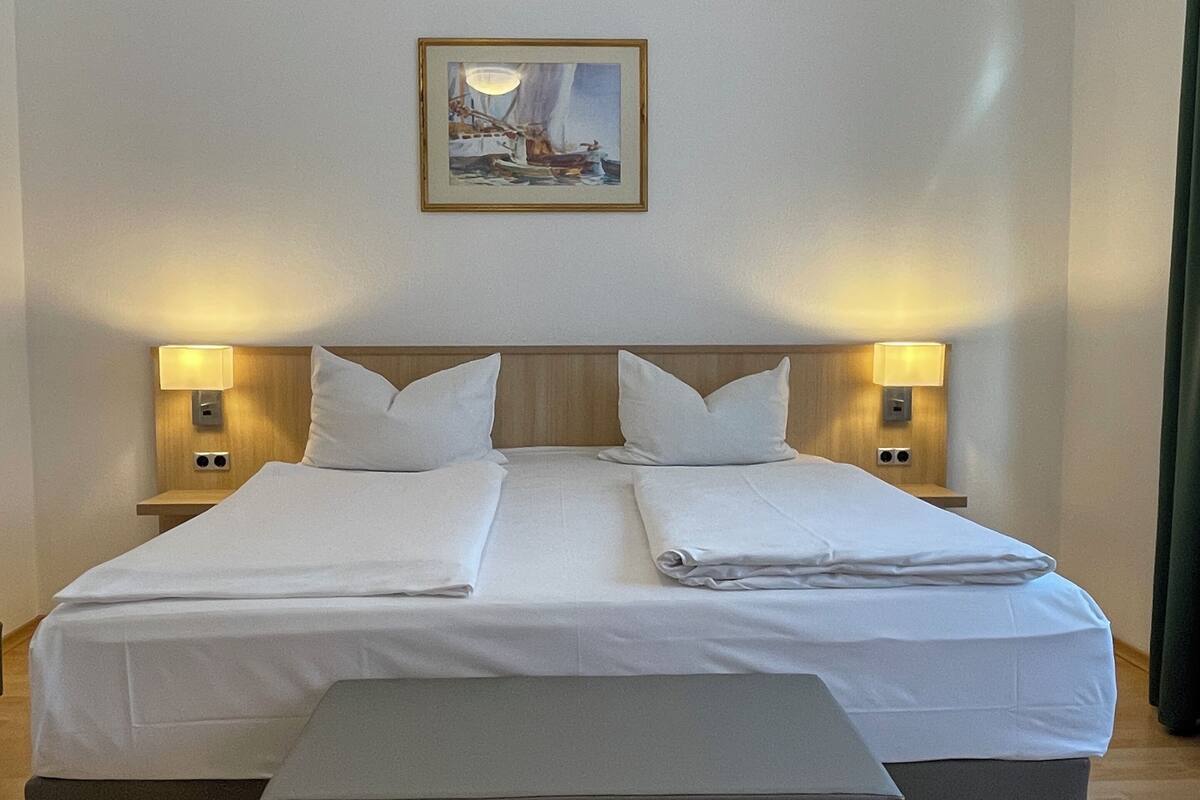 Basic Double Room | Hypo-allergenic bedding, down comforters, memory foam beds