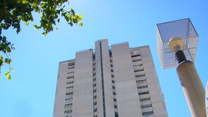 A tall building with a sign for 'INMOBILIARIA MARINA BAIXA' and 'SANTA MARGARITA'. - SANTA MARGARITA (ESTUDIO) (Benidorm)