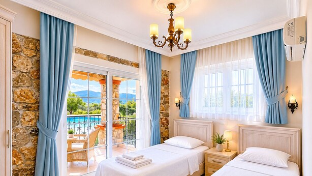 A hotel room with two beds, a stone wall, a balcony with a pool, and a view of the mountains. - Stunning Villa Sana Perfect Condition, Private 100 m³ Pool & 1000m2 Garden WIFI (Muğla)