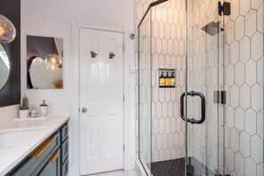 Shower, hair dryer, towels