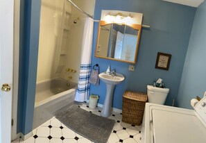 Combined shower/bathtub, hair dryer, towels, soap