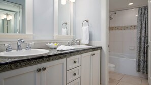 Combined shower/bathtub, hair dryer, towels, soap