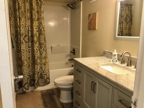 Hair dryer, towels, soap, toilet paper