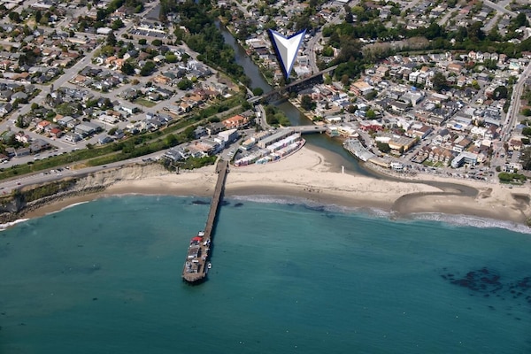 Arial view of Capitola beach community. Arrow is the location of Riverview house