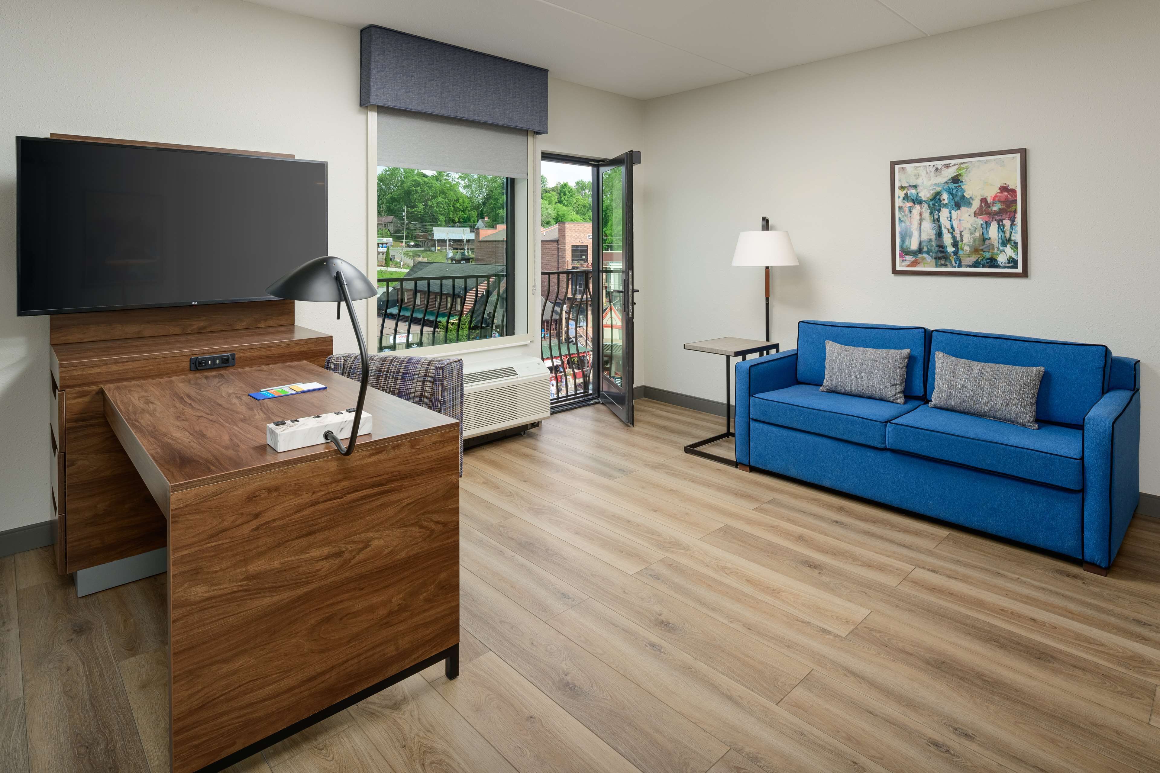 studio, 1 king bed, city view | in-room safe, desk, laptop workspace, blackout curtains