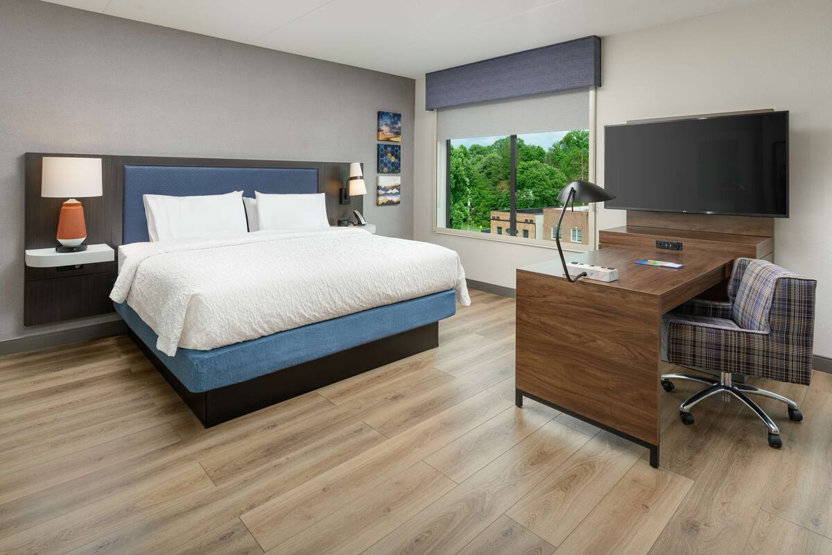 studio, 1 king bed, city view | in-room safe, desk, laptop workspace, blackout curtains