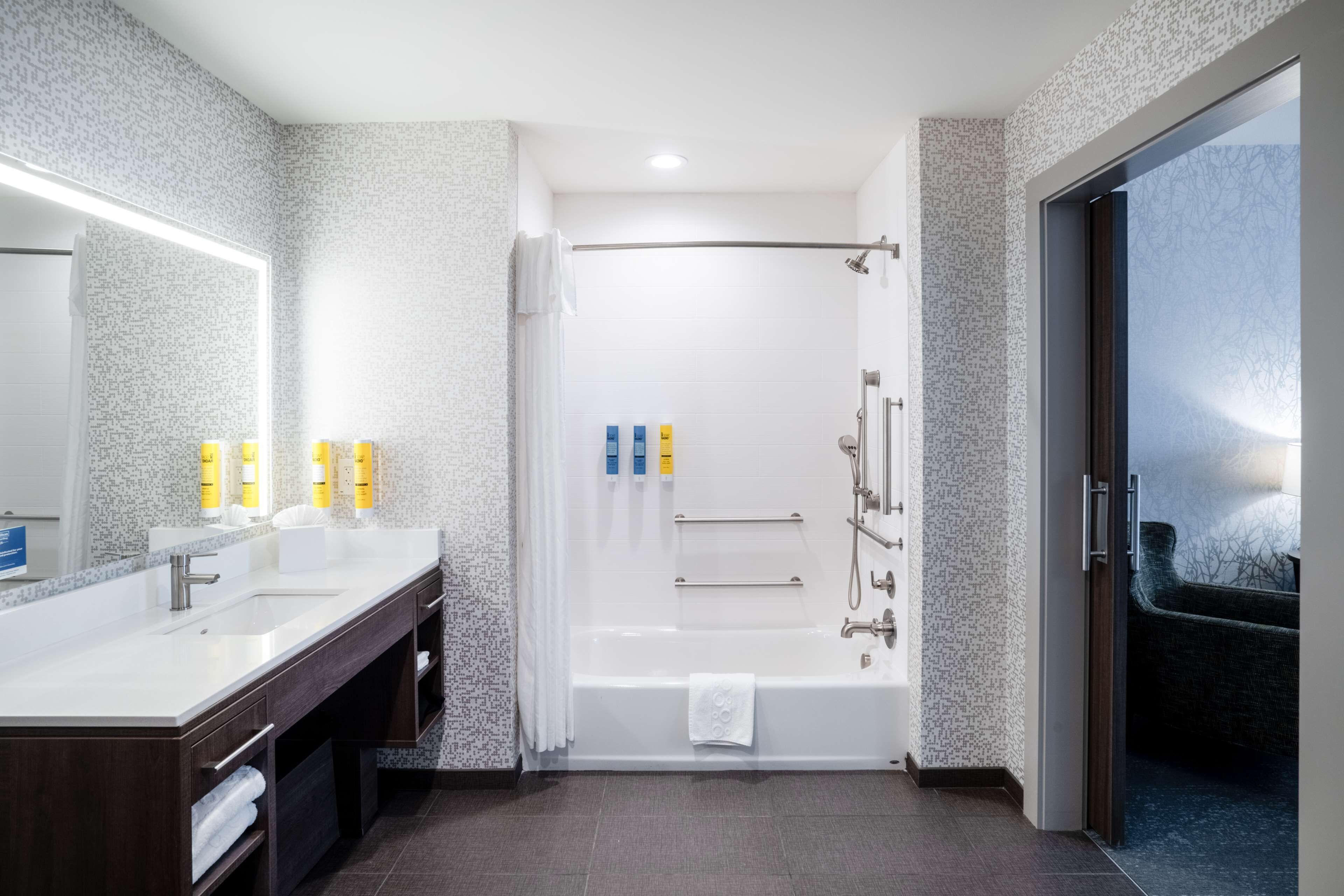 suite, 1 king bed, accessible, bathtub (mobility & hearing) | bathroom | designer toiletries, hair dryer, towels