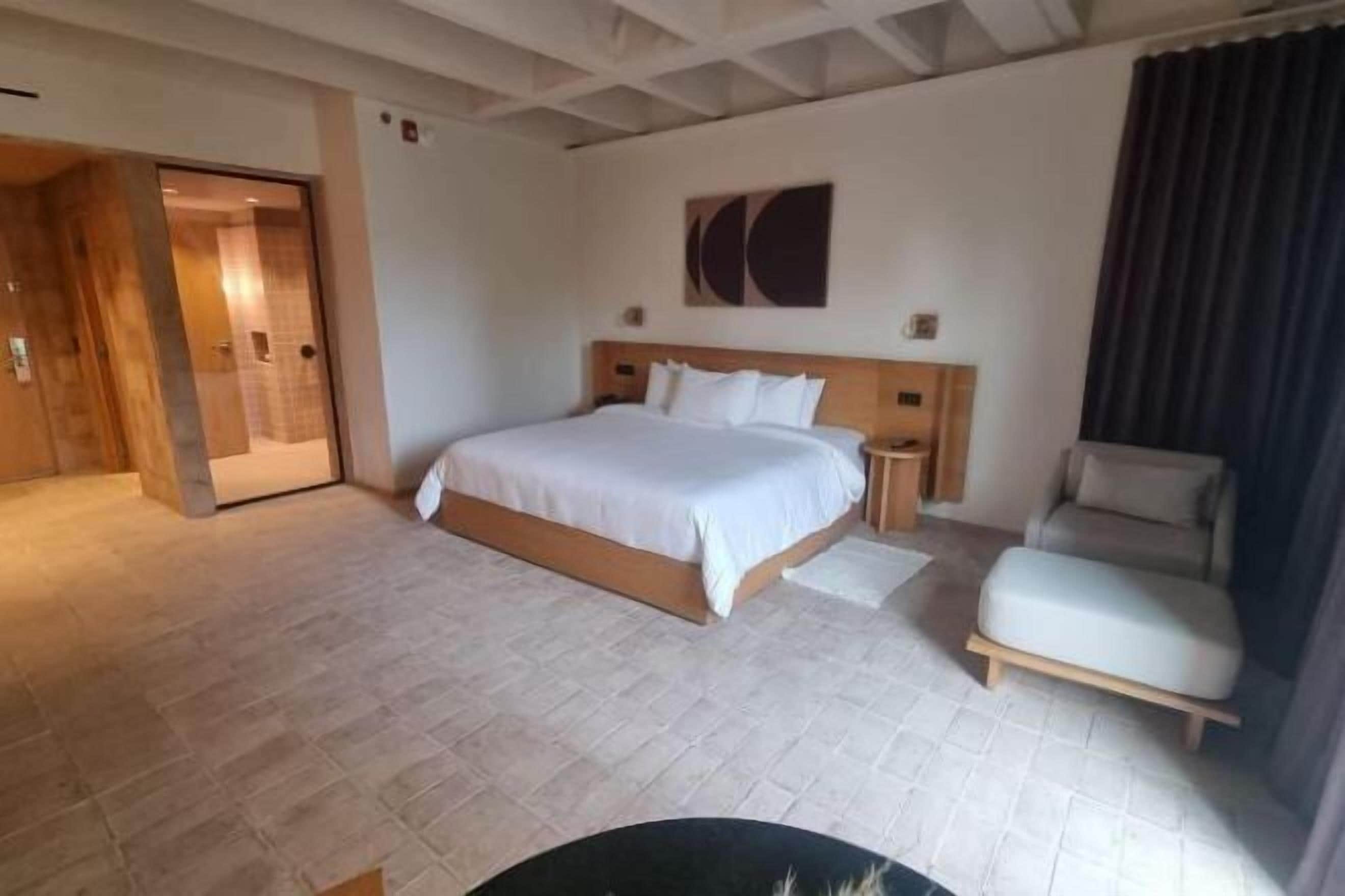 Premium bedding, down duvets, in-room safe, desk