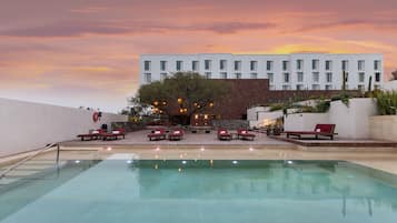 Outdoor pool, open 8:00 AM to 8:00 PM, pool umbrellas, sun loungers