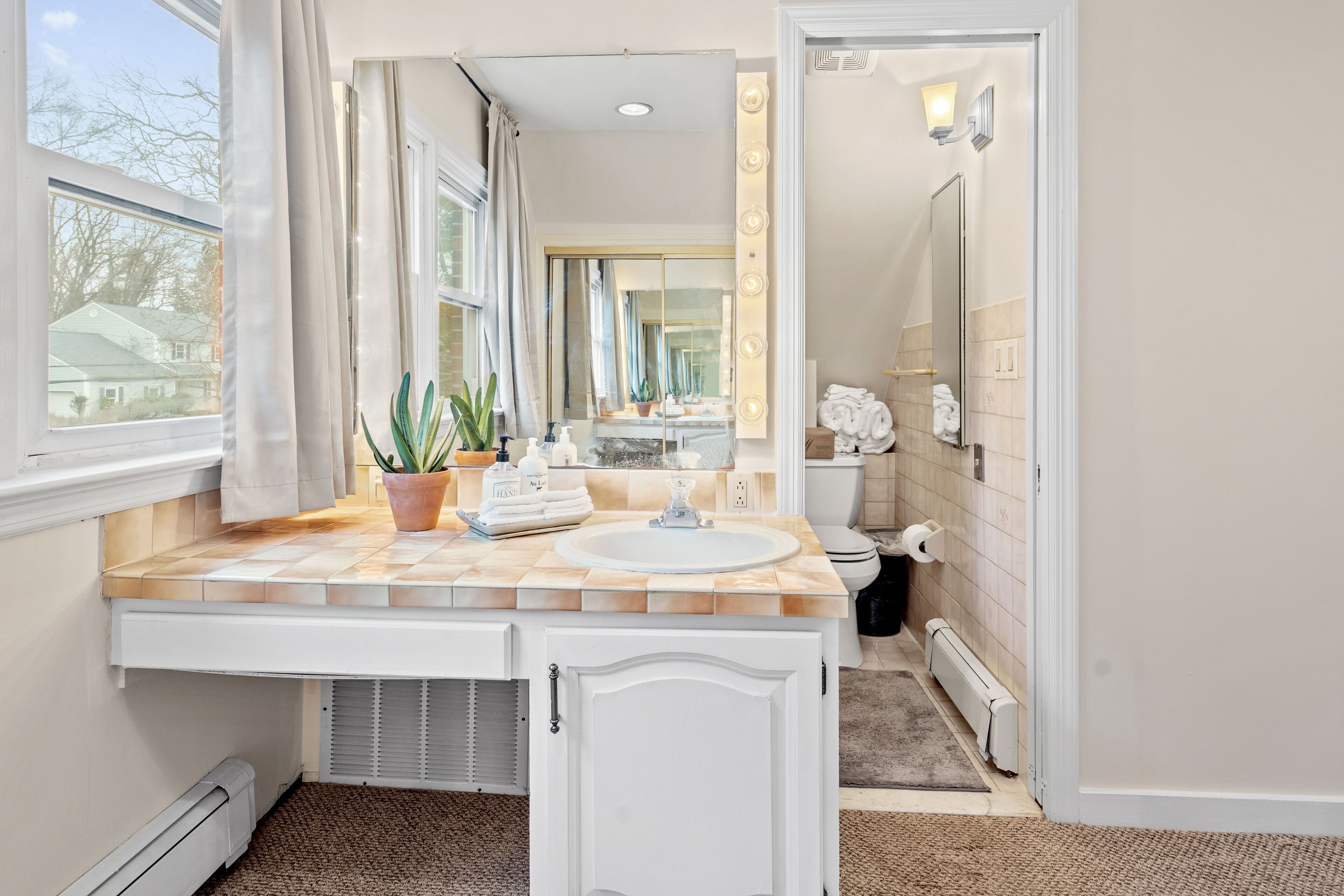 Combined shower/tub, hair dryer, towels, soap