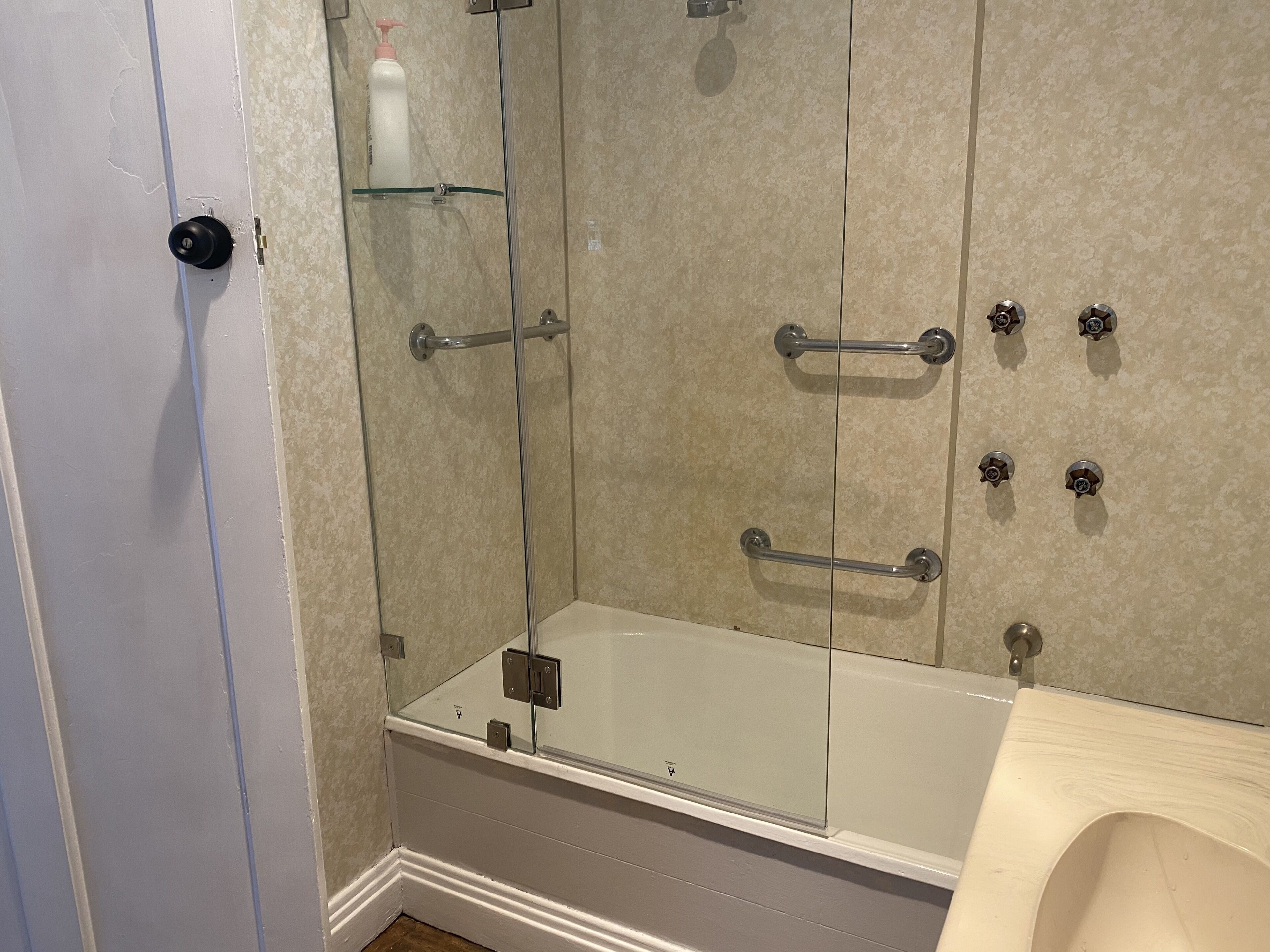 Combined shower/bathtub, hair dryer, towels, soap