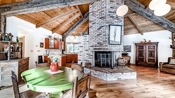 TV, fireplace, books