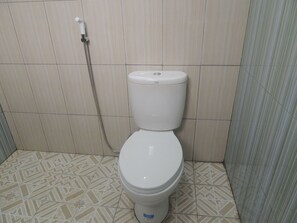 Habitación superior | Baño | Regadera y toallas 