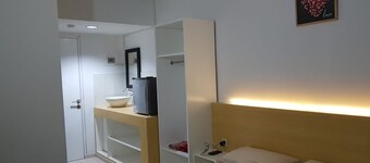 Grand Sentraland Karawang by Gkit Room