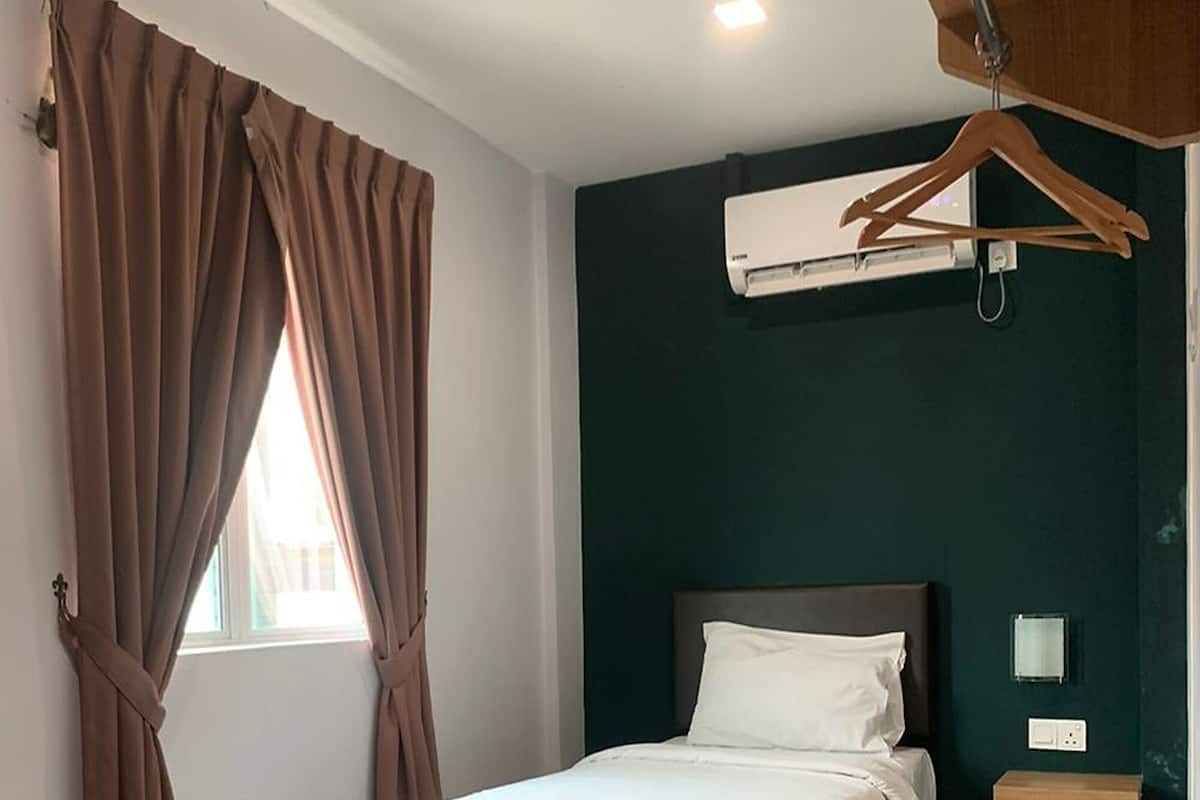 Singola Deluxe | 1 camera, una scrivania, Wi-Fi gratuito, lenzuola