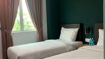 Habitación Deluxe con 2 camas individuales | Wifi gratis y ropa de cama