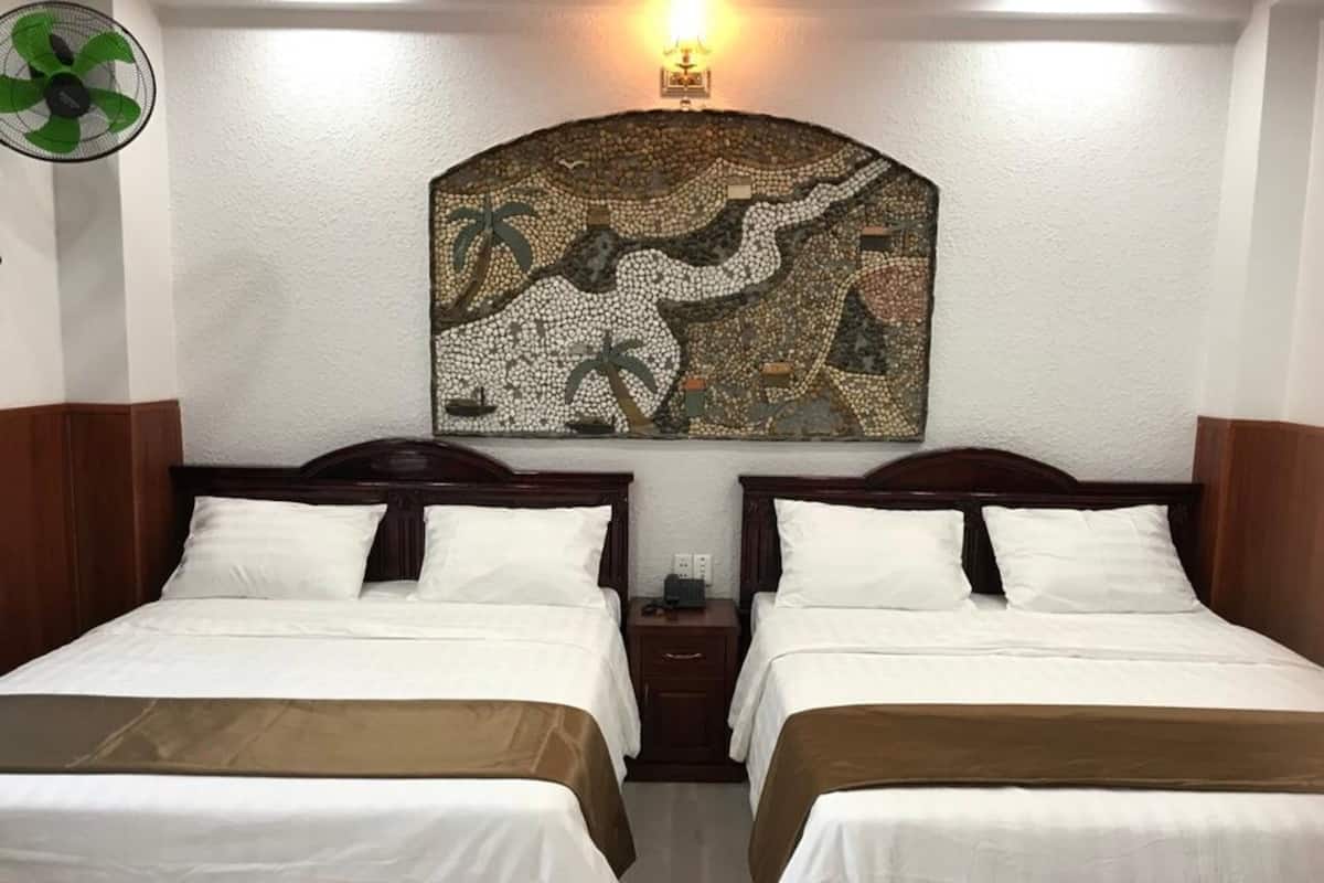 Quarto família (Deluxe) | Wi-Fi de cortesia, roupa de cama