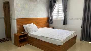 Kamar Double Standar | Minibar, meja kerja, Wi-Fi gratis, dan seprai linen